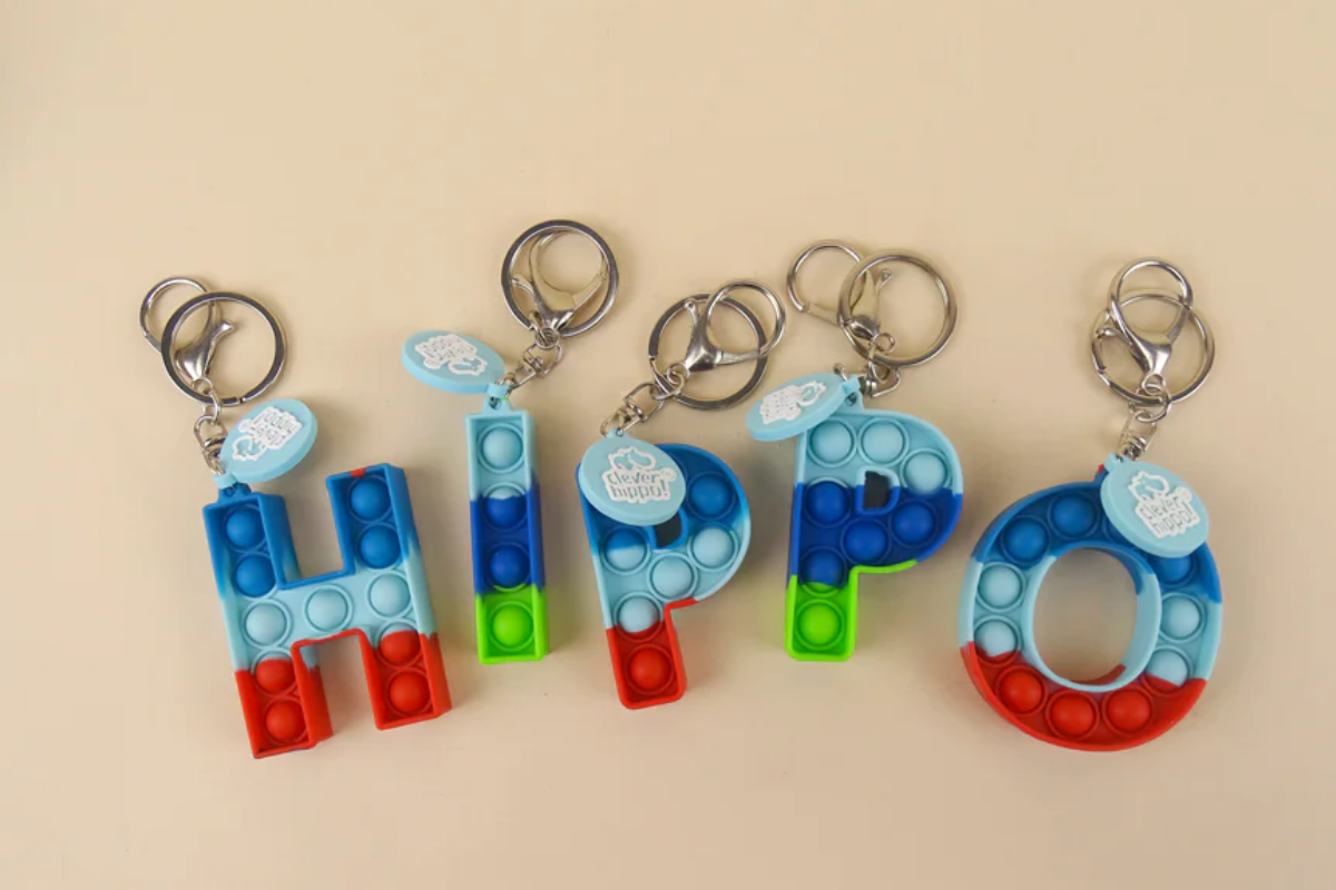 Móc khóa Pop It cầu vồng dễ thương cho bé